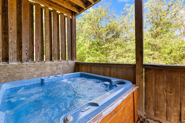 exterior space featuring a hot tub