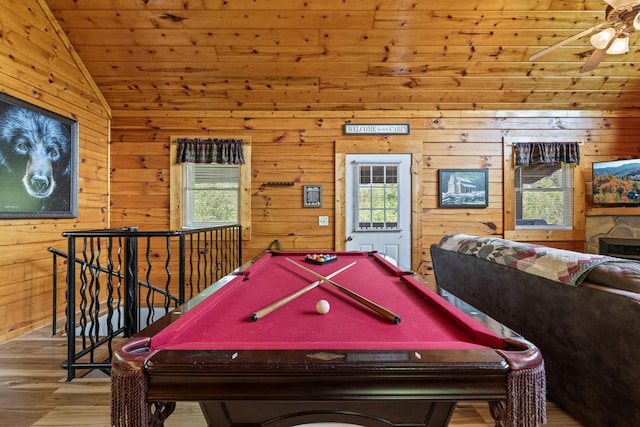 playroom featuring wooden walls, lofted ceiling, and billiards