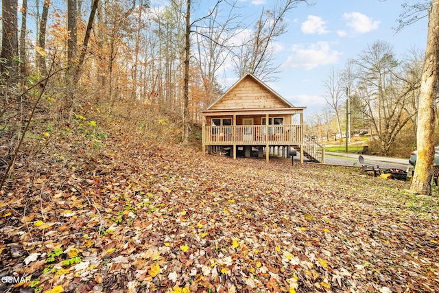 back of property with a deck