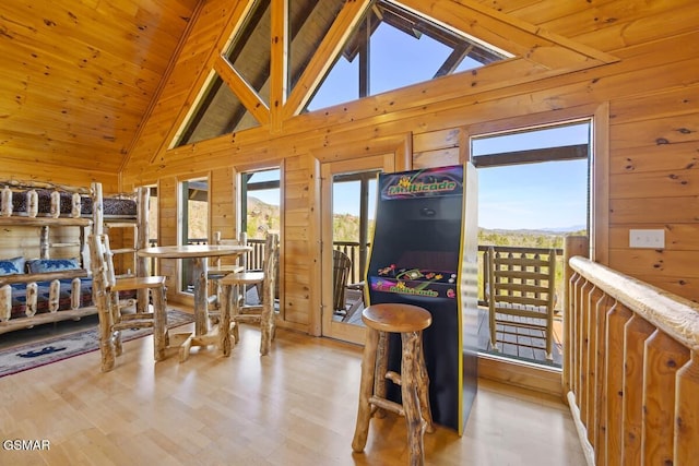 2839 Cedar Falls Way, Sevierville, TN 37862 - dining space featuring wooden walls, wood finished floors, and wooden ceiling