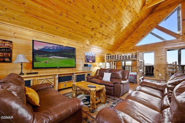 2839 Cedar Falls Way, Sevierville, TN 37862 - living room with wooden walls, wood finished floors, and high vaulted ceiling
