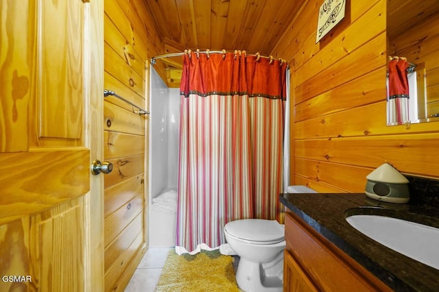 2839 Cedar Falls Way, Sevierville, TN 37862 - full bathroom with vanity, tile patterned floors, wood walls, and curtained shower