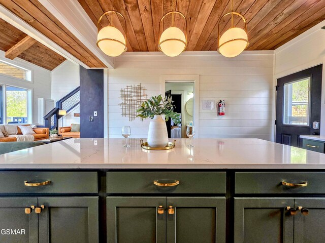 kitchen featuring green cabinets, open floor plan, wooden ceiling, and light countertops