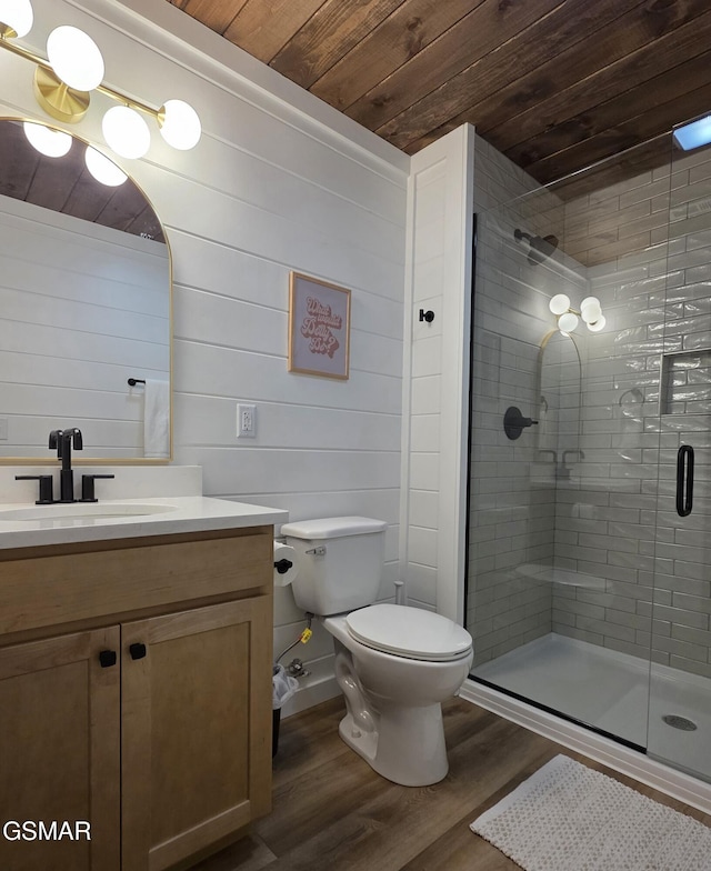 full bath with vanity, toilet, wooden ceiling, wood finished floors, and a stall shower