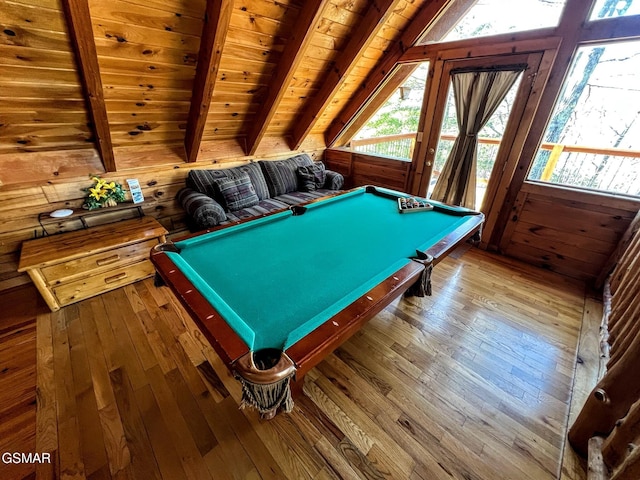 playroom featuring pool table, wooden walls, vaulted ceiling with beams, and wood-type flooring