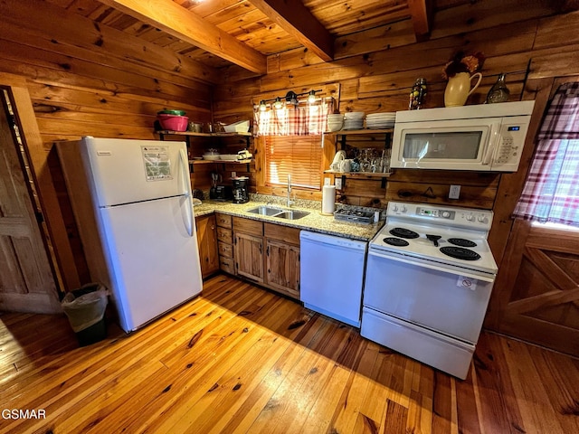 kitchen featuring a sink, open shelves, white appliances, and hardwood / wood-style floors