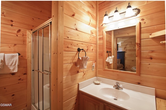 4610 High Vista Way, Pigeon Forge, TN 37863 - full bathroom featuring wooden walls, a stall shower, and vanity