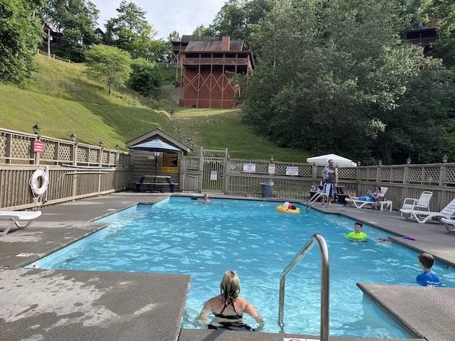 view of pool featuring a patio area