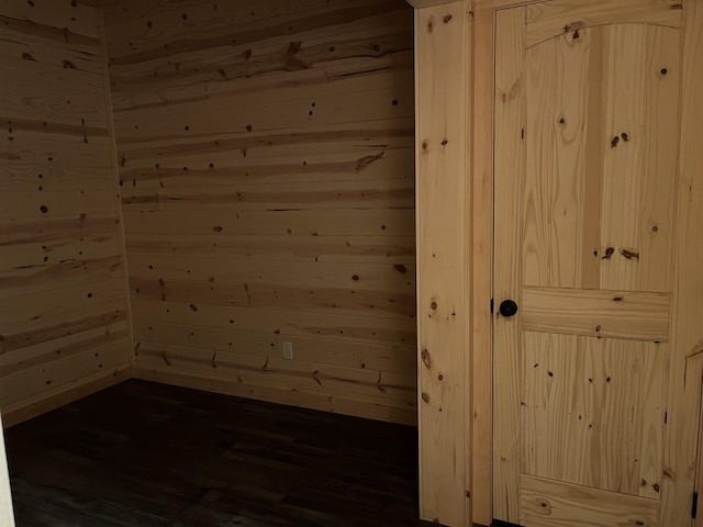 empty room with wooden walls