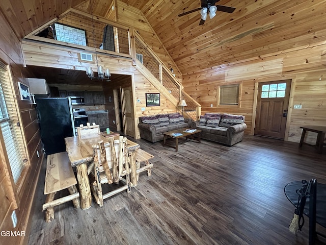 living room featuring ceiling fan with notable chandelier, dark hardwood / wood-style flooring, wood ceiling, and high vaulted ceiling