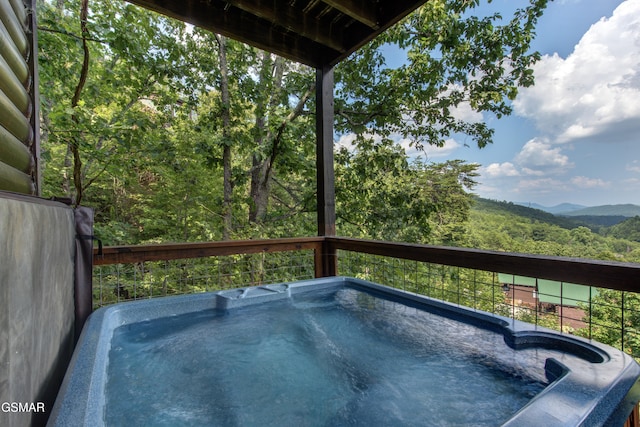 wooden terrace featuring a mountain view