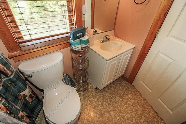 bathroom with vanity and toilet