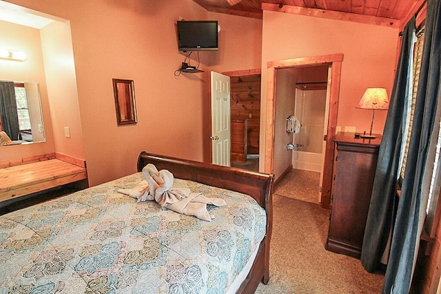 carpeted bedroom with vaulted ceiling and wooden ceiling