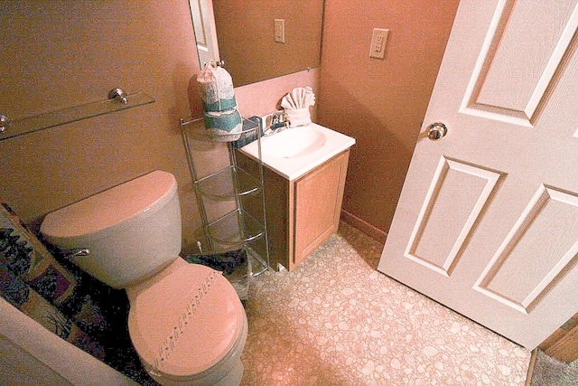 bathroom with vanity and toilet