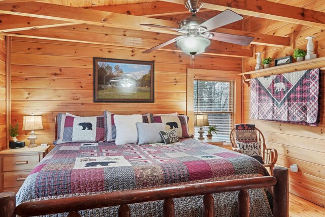 1706 Springer Rd, Sevierville, TN 37862 - bedroom featuring wood finished floors, wooden walls, and beam ceiling