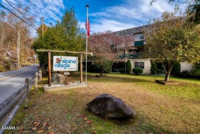 260 Roaring Fork Rd Unit 217, Gatlinburg, TN 37738 - view of community with a yard