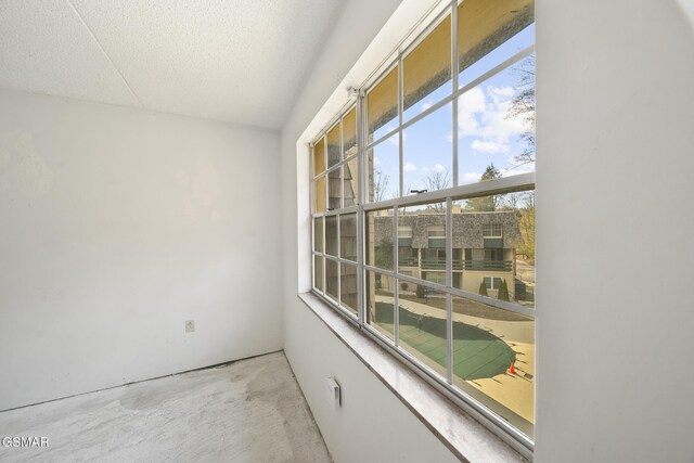 260 Roaring Fork Rd Unit 217, Gatlinburg, TN 37738 - unfurnished room with concrete flooring and a textured ceiling