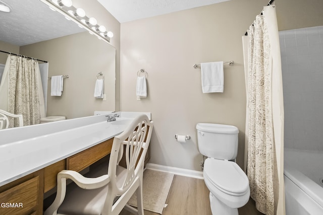 1733 Snapp Rd, Sevierville, TN 37862 - full bath featuring toilet, vanity, baseboards, shower / bathtub combination with curtain, and a textured ceiling