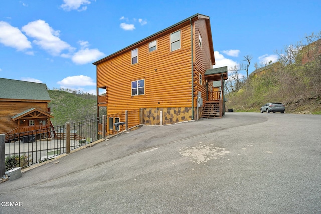 view of home's exterior with a mountain view