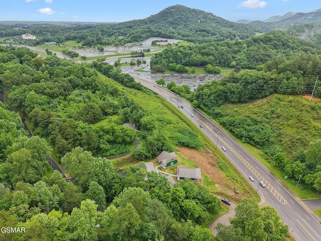 1010 Pinyon Cir, Pigeon Forge, TN 37863 - drone / aerial view of a main thoroughfare and a mountainous background