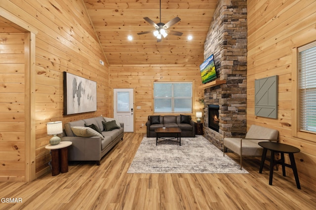 1010 Pinyon Cir, Pigeon Forge, TN 37863 - living room with high vaulted ceiling, wood finished floors, ceiling fan, wood walls, and wooden ceiling