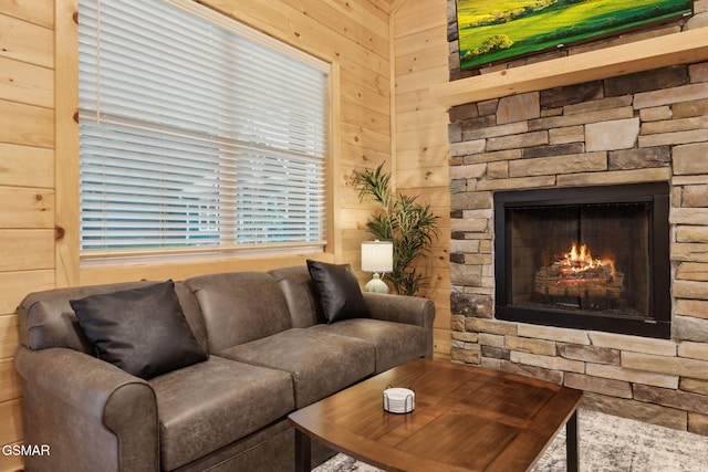 1010 Pinyon Cir, Pigeon Forge, TN 37863 - living room with wooden walls and a stone fireplace