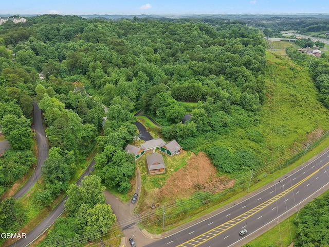 1010 Pinyon Cir, Pigeon Forge, TN 37863 - aerial view of property and surrounding area with a heavily wooded area