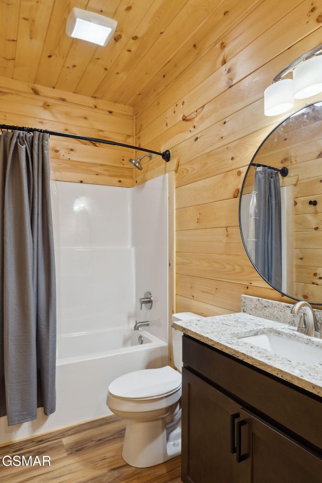 1010 Pinyon Cir, Pigeon Forge, TN 37863 - bathroom featuring shower / bath combo, wood walls, wood finished floors, vanity, and wooden ceiling