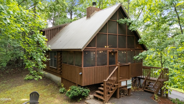 1514 Ridgecrest Dr, Sevierville, TN 37876 - view of outdoor structure with a sunroom and stairway