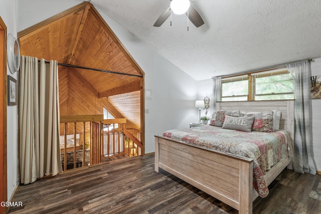 1514 Ridgecrest Dr, Sevierville, TN 37876 - bedroom with a textured ceiling, vaulted ceiling, dark wood-style flooring, and ceiling fan