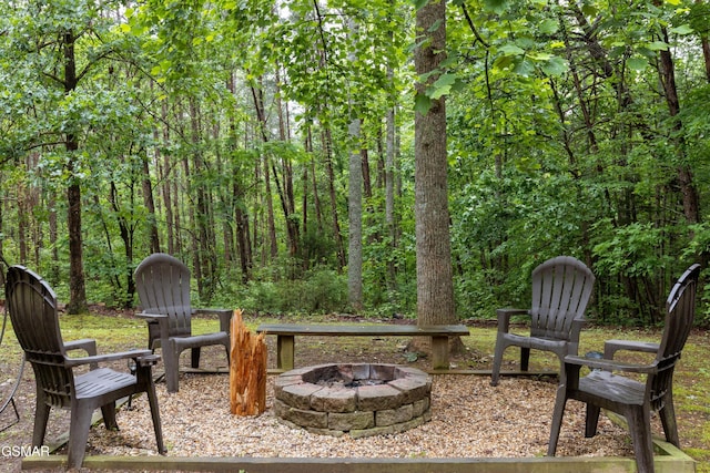 1514 Ridgecrest Dr, Sevierville, TN 37876 - view of patio featuring a fire pit and a view of trees