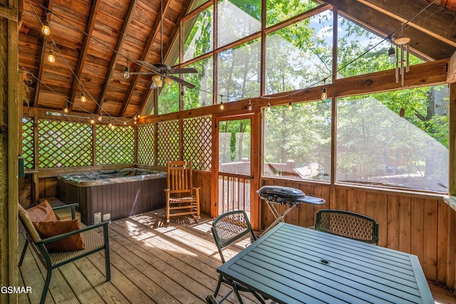 1514 Ridgecrest Dr, Sevierville, TN 37876 - sunroom with a jacuzzi, outdoor dining area, ceiling fan, and healthy amount of natural light