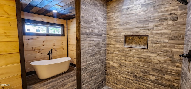 full bathroom with a soaking tub