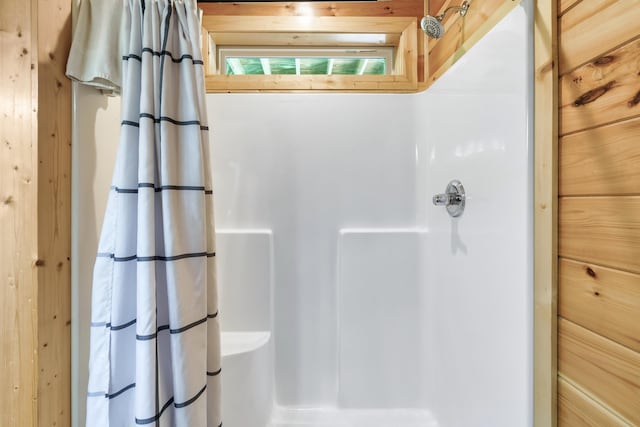 bathroom featuring a shower with curtain