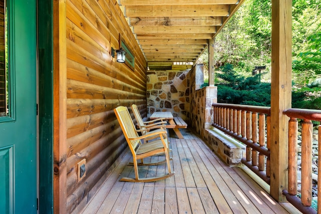 wooden deck with a porch