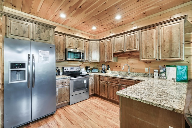 kitchen with light stone countertops, sink, wooden ceiling, light hardwood / wood-style floors, and appliances with stainless steel finishes