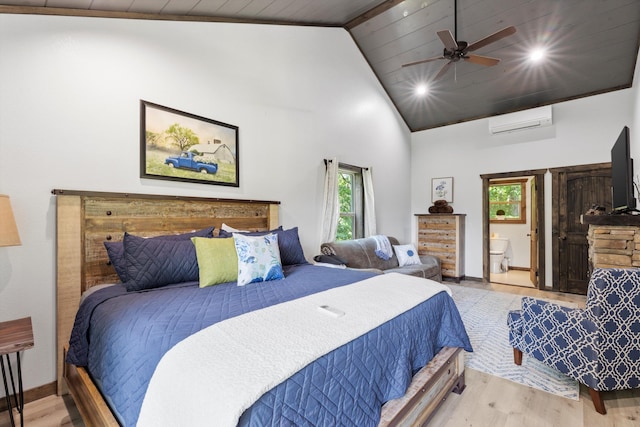 441 Matterhorn Dr, Gatlinburg, TN 37738 - bedroom featuring a wall mounted air conditioner, wooden ceiling, light hardwood / wood-style flooring, ceiling fan, and connected bathroom