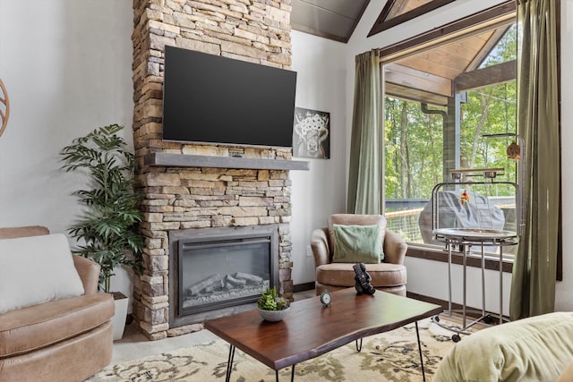 441 Matterhorn Dr, Gatlinburg, TN 37738 - living room featuring a stone fireplace and lofted ceiling