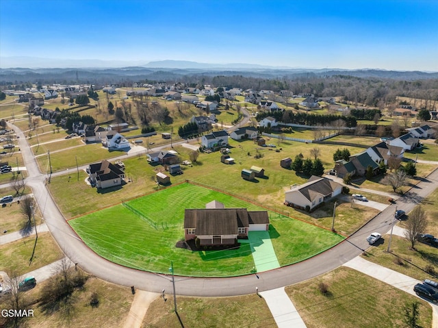 drone / aerial view featuring a mountain view