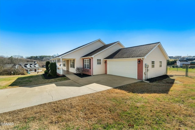 single story home with a front yard and a garage