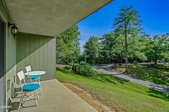526 Briarcliff Way Apt 102, Pigeon Forge, TN 37863 - view of patio / terrace with view of wooded area