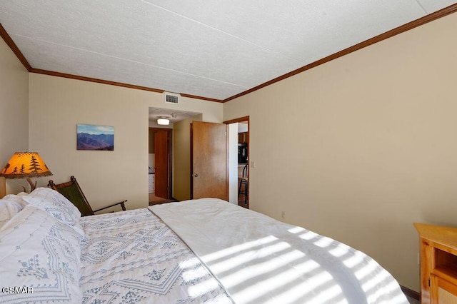 bedroom featuring crown molding