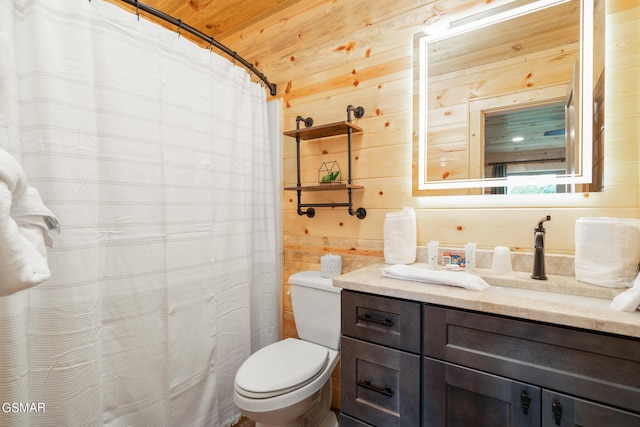 bathroom featuring wood walls, vanity, wood ceiling, and toilet