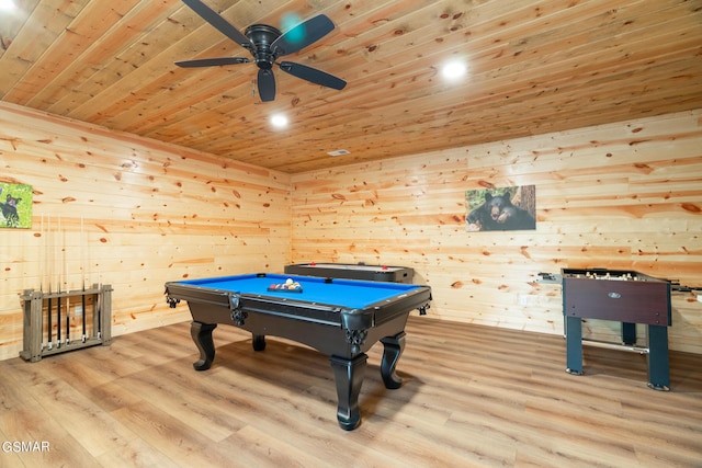 recreation room featuring ceiling fan, billiards, wooden walls, wood ceiling, and light wood-type flooring