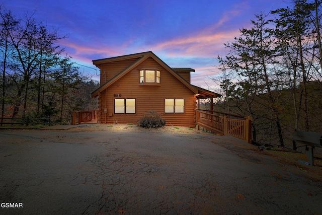 view of property exterior at dusk