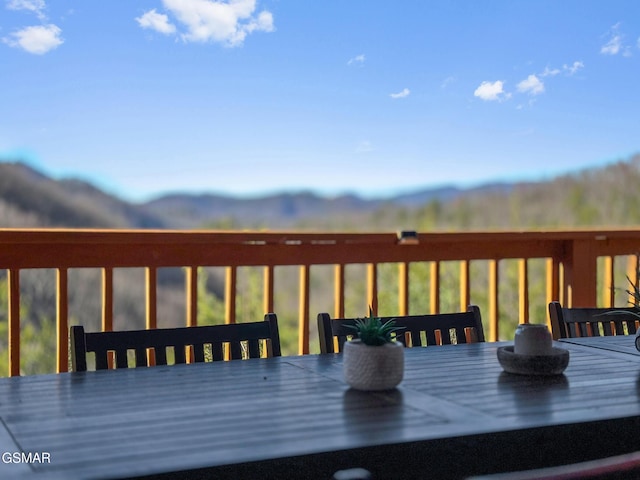 deck with a mountain view