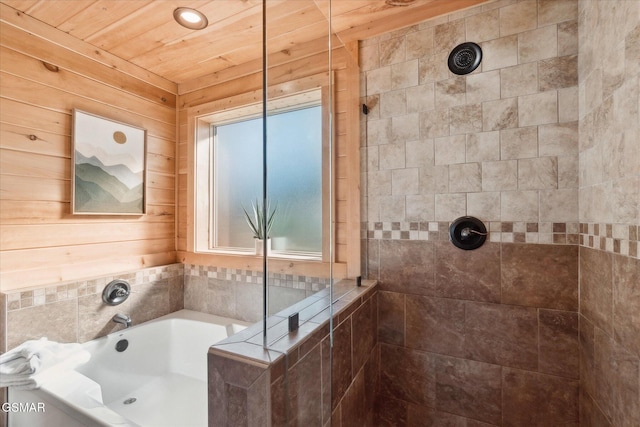 full bathroom featuring wooden ceiling, a garden tub, a tile shower, and wooden walls