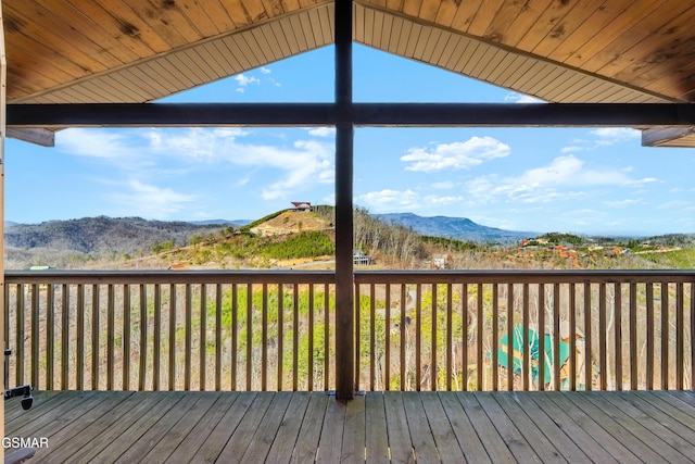 wooden deck featuring a mountain view