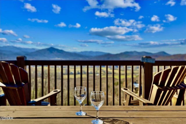 balcony featuring a mountain view