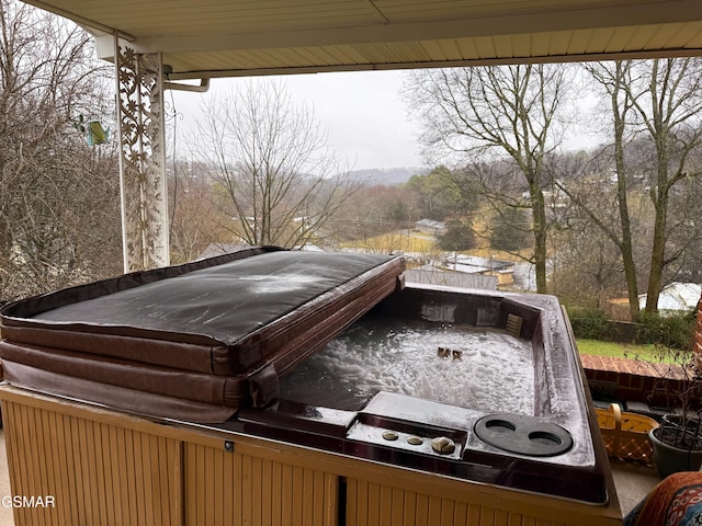 exterior space with a jacuzzi